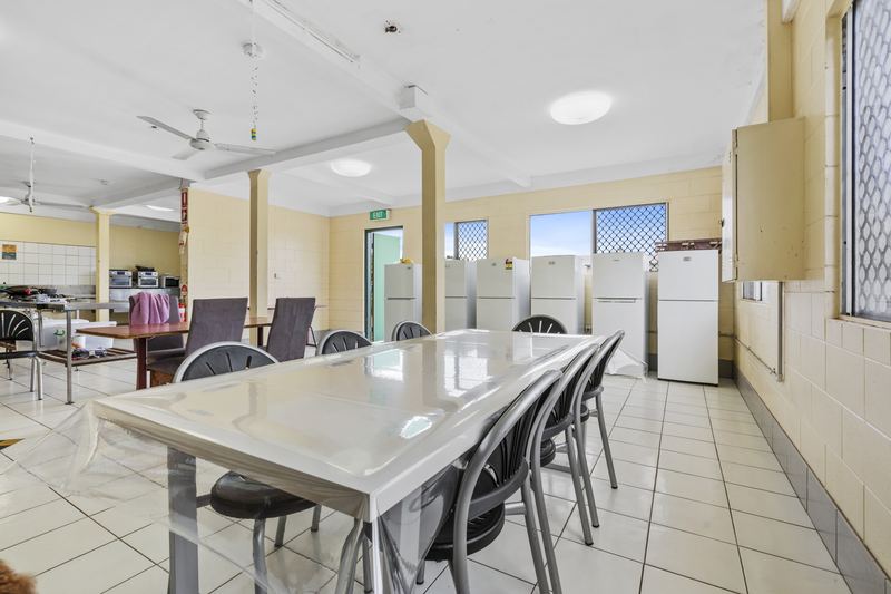 Long tables and a fridge each