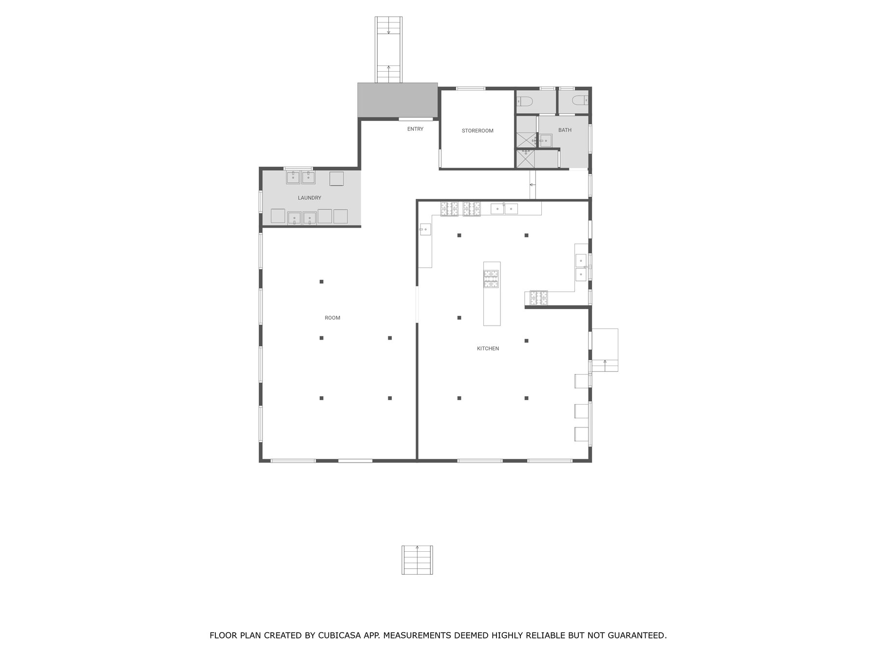 Ground floor plan: kitchen, common room, laundry, storeroom and bathrooms